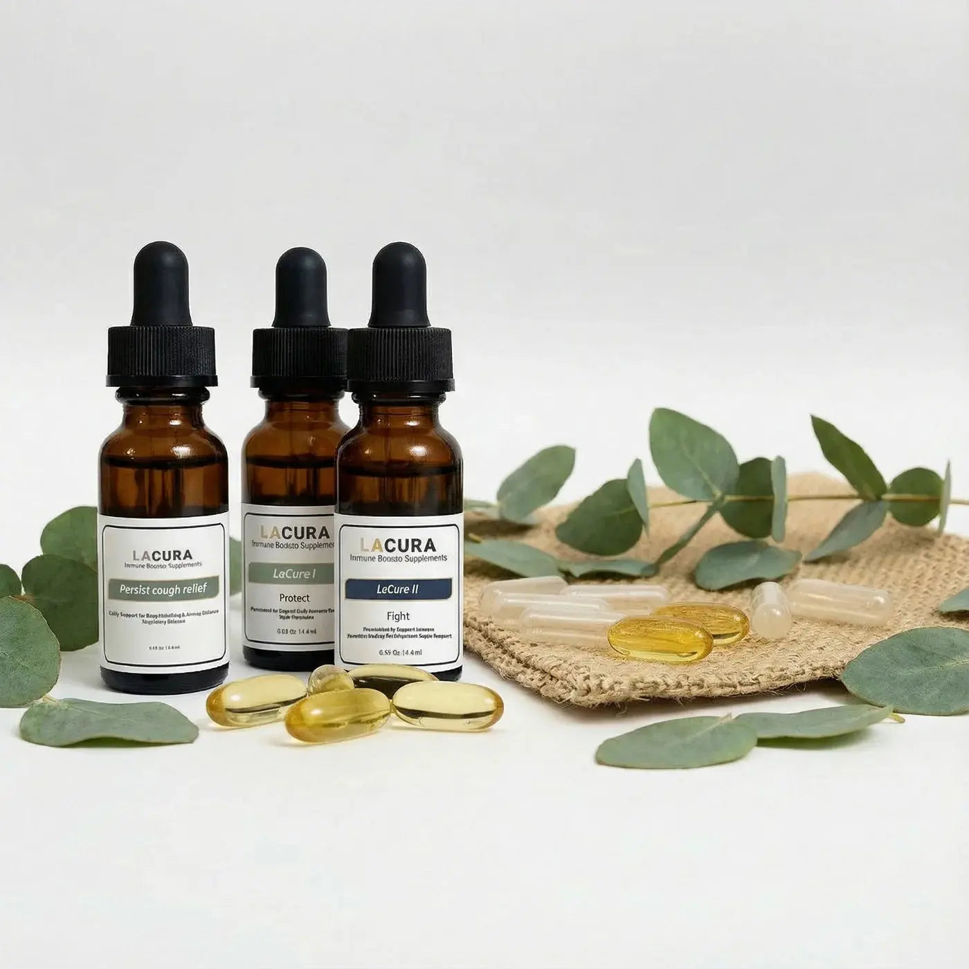 Three Lacura dropper bottles with green leaves and a woven mat on a white background